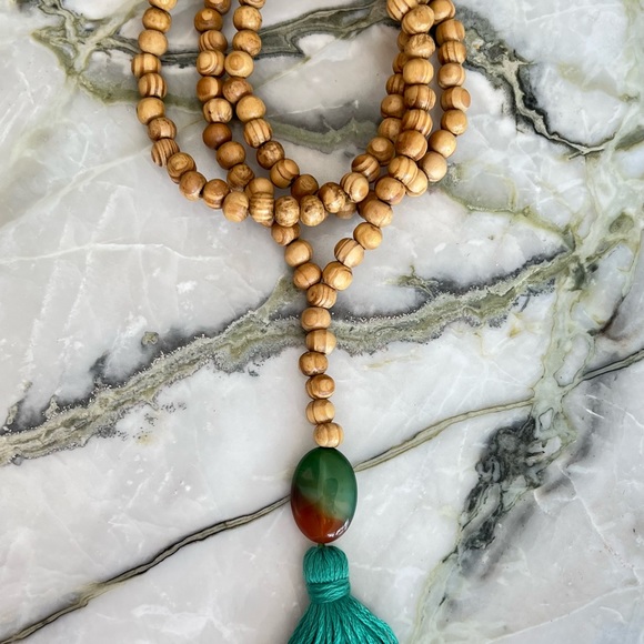 Mala Necklace with Agate Bead, Wood Beads, & Tassel in Green - Picture 4 of 6